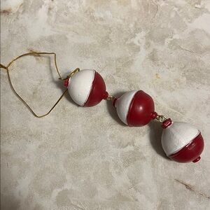 Christmas tree ornament string of 3 fishing bobbers. Fisherman